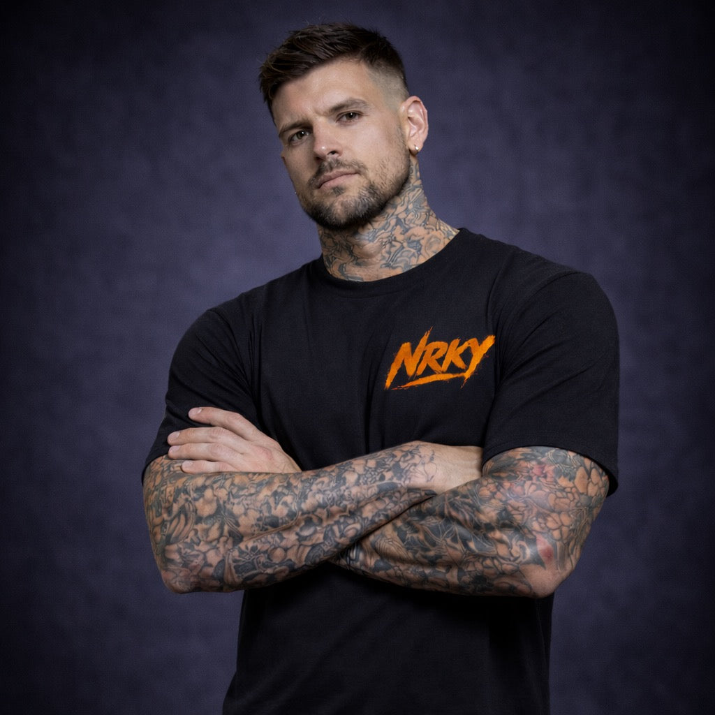 Men’s Disruption Tee - Orange on Black