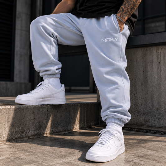 Men's Anarchy powder blue tracksuit pants on model