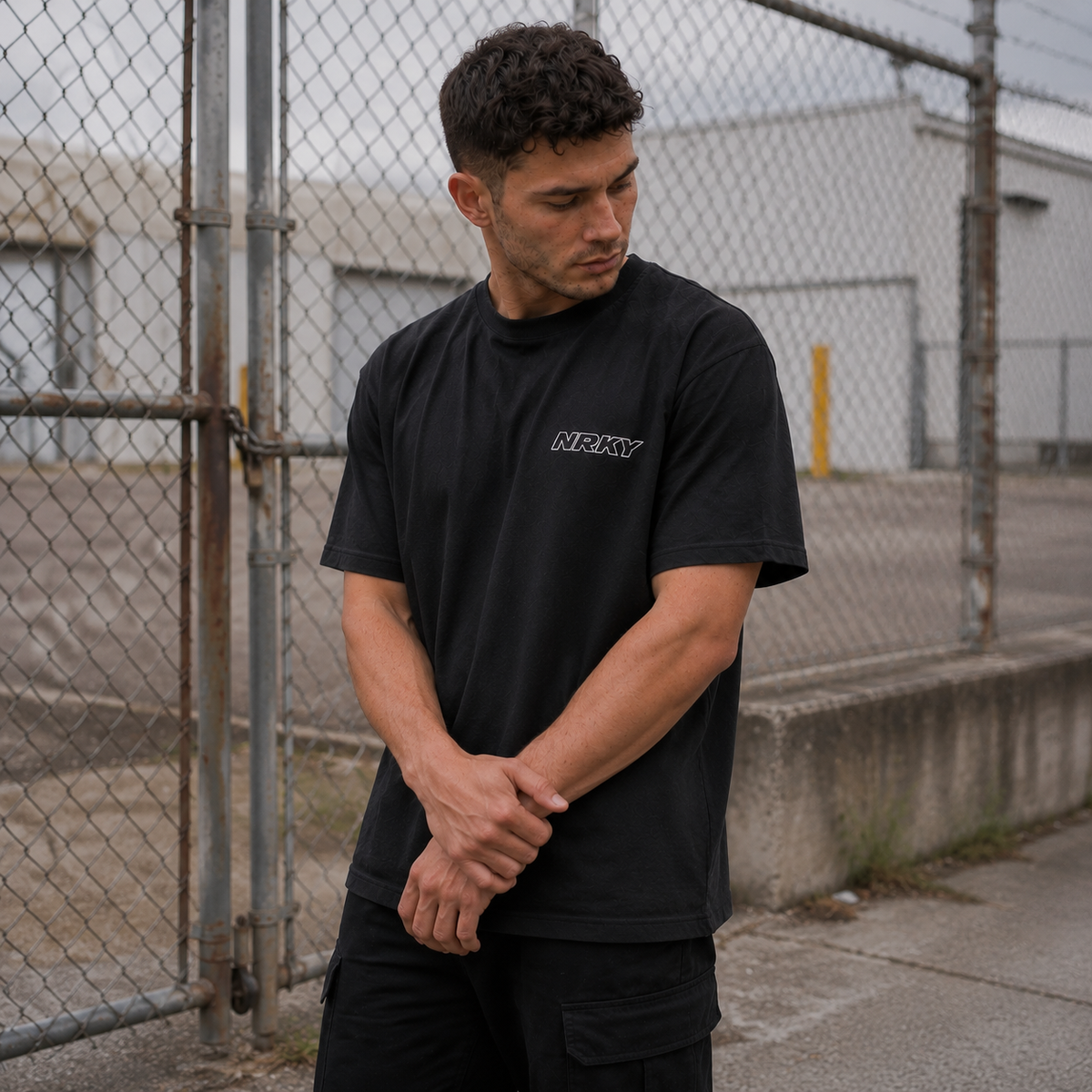 NRKY Men's Defiance Tee yellow on black back