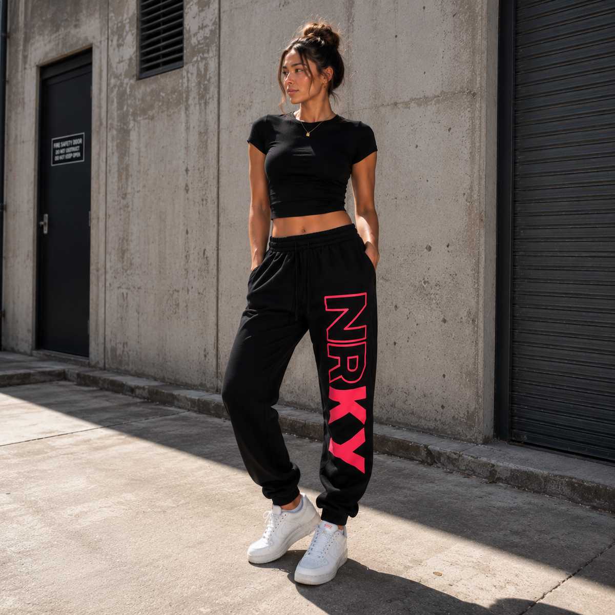 NRKY Women's Revolution Tracksuit Pants pink on black back
