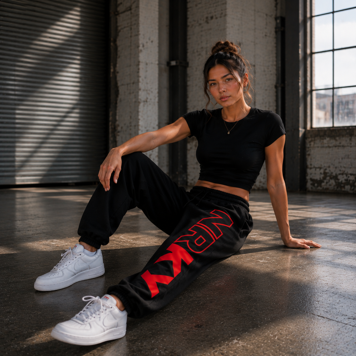 NRKY Women's Revolution Tracksuit Pants red on black back